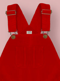 Add a fresh and playful touch to your girl’s summer wardrobe with the Cherry Crumble Peach Vertical Lines Summer Dungaree. this dungaree offers breathability and comfort.