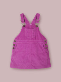 Brighten up your little girl’s summer wardrobe with the Cherry Crumble Lavender Dungaree Dress, a charming and comfortable outfit crafted for all-day wear.